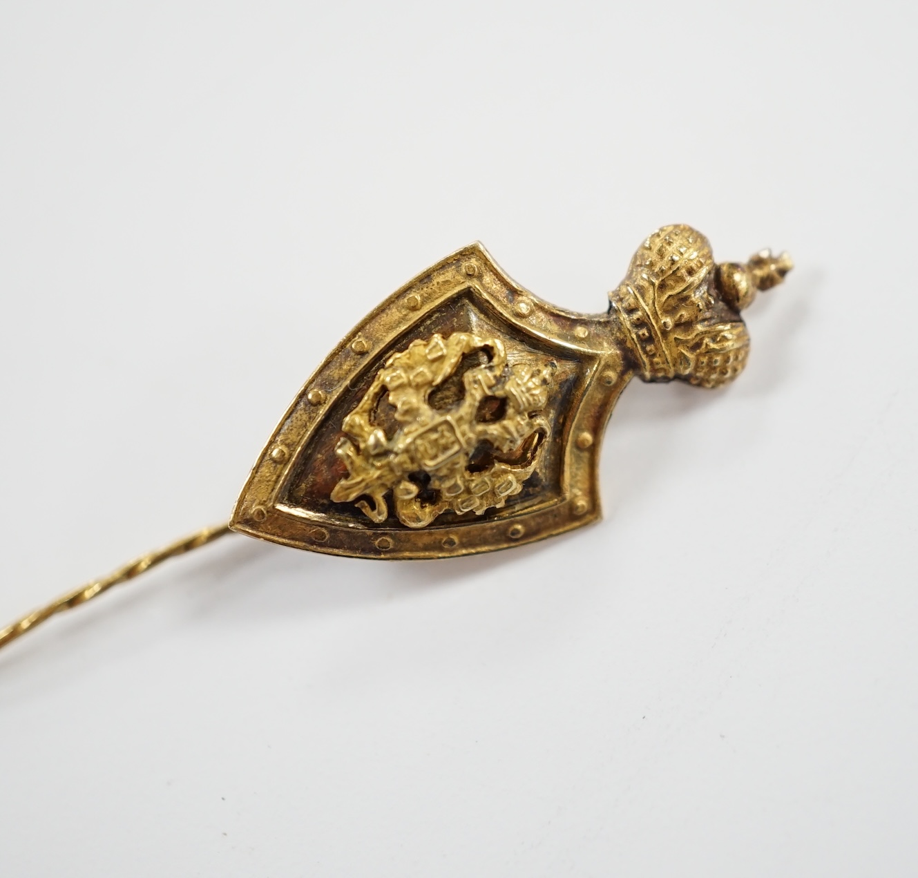 A Russian yellow metal (tests as 14k) Imperial Philanthropic Society for the Vocational Education of Poor Children stick pin, 48mm, 0.7 grams.